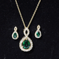 Pear Shaped Lab Created Emerald and Diamond Infinity Jewelry Set