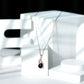 Collar con colgante de hoja de ónix negro y diamante, con ónix en forma de pera