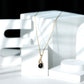 Collar con colgante de hoja de ónix negro y diamante, con ónix en forma de pera
