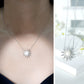 Collar con colgante en forma de sol con perla natural de agua dulce y diamantes