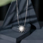 Collar con colgante en forma de sol con perla natural de agua dulce y diamantes