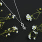 Minimal Moissanite Infinity Knot Pendant Necklace