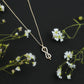 Minimal Moissanite Infinity Knot Pendant Necklace