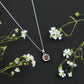 Cushion Cut Garnet and Moissanite Halo Pendant Necklace With Chain