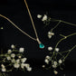 Pear Cut Emerald Solitaire Pendant with Diamond Accent Bail