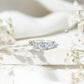 3 Stone Round Moissanite Crossover Engagement Ring