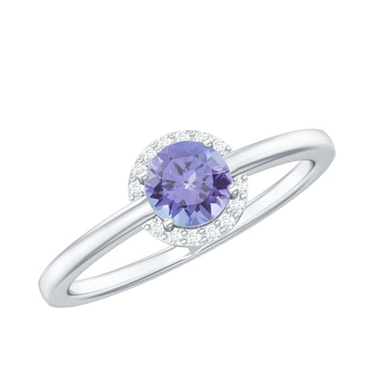 Anillo de compromiso de tanzanita natural con halo de diamantes