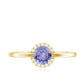Anillo de compromiso de tanzanita natural con halo de diamantes