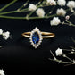 Marquise Cut Lab Grown Blue Sapphire and Diamond Halo Engagement Ring