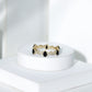 Pear Shaped Black Onyx and Diamond Crossover Wedding Band