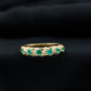 Anillo de boda de diseño para mujer con esmeraldas y diamantes