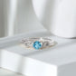 Round Shape Aquamarine and Diamond Infinity Engagement Ring