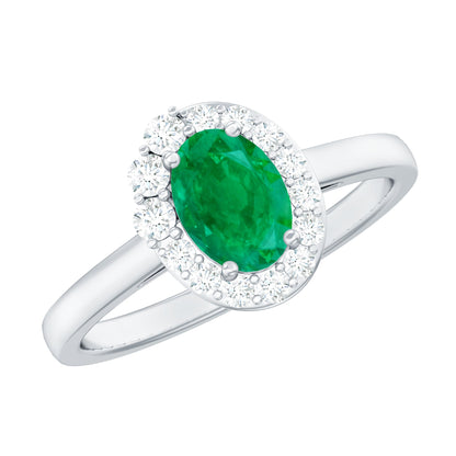 Anillo de compromiso ovalado de esmeralda natural con halo de diamantes
