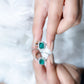 1.6 Carat Emerald Cut Lab Created Emerald Engagement Ring With Moissanite Halo