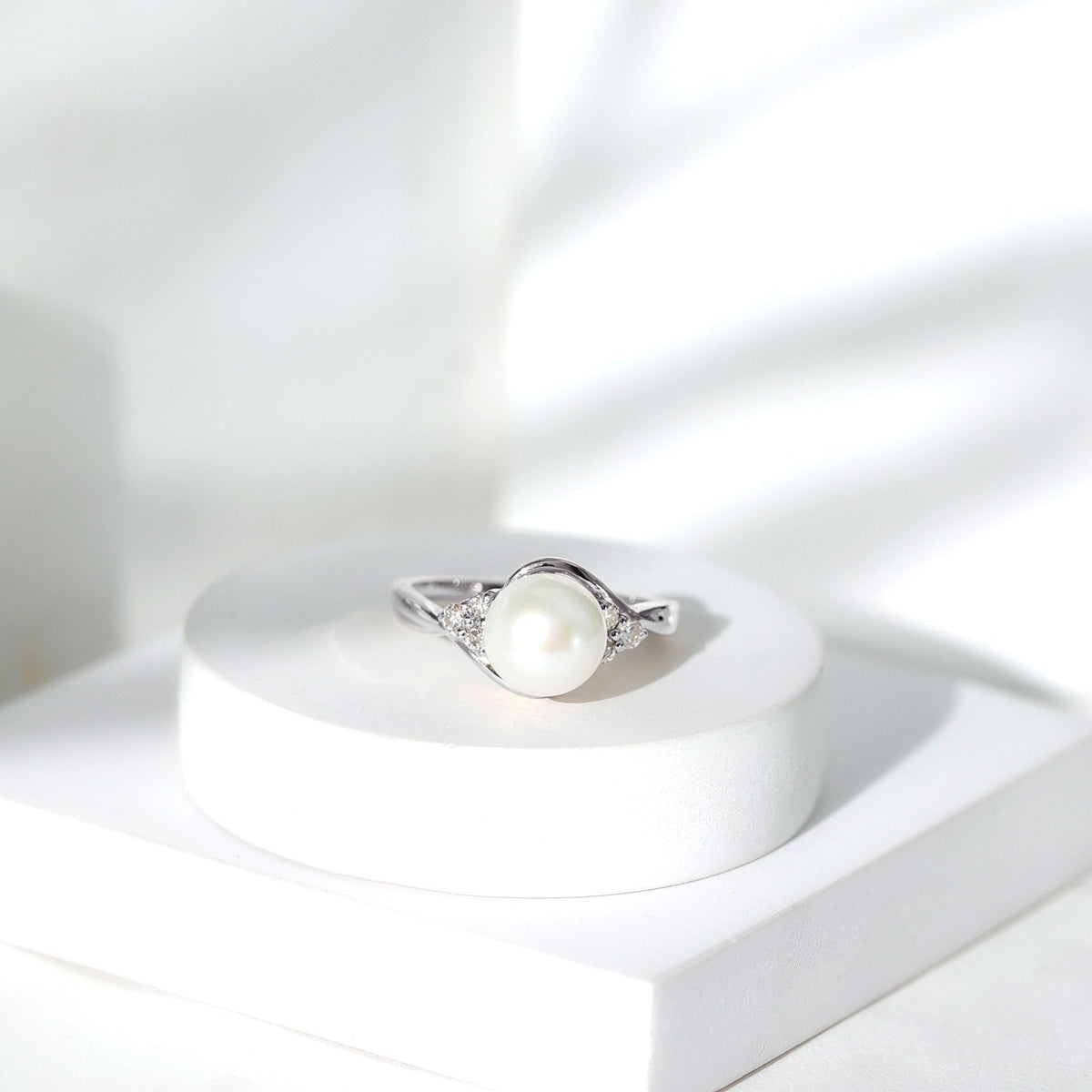 Natural 7.4 Carat Freshwater Pearl Engagement Ring with Diamond Trio
