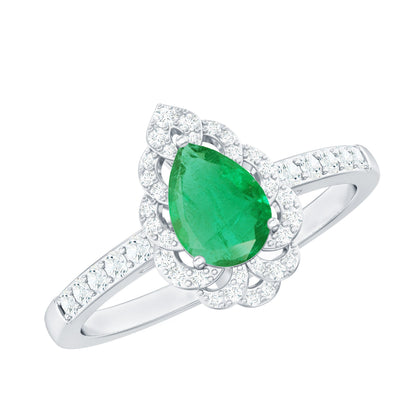 Anillo de compromiso de esmeralda talla pera con diamantes con motivos naturales
