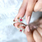 Natural 0.6 Carat Ruby Flower Engagement Ring with Diamond Bypass Shank