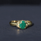 Oval Cut Emerald Solitaire Engagement Ring with Bow Design
