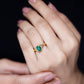 Oval Cut Emerald Solitaire Engagement Ring with Bow Design