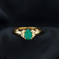 Oval Cut Emerald Solitaire Engagement Ring with Bow Design