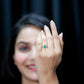 Solitaire Oval Emerald Engagement Ring with Diamonds