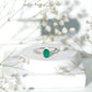 Solitaire Oval Emerald Engagement Ring with Diamonds