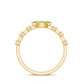 Anillo de peridoto de 0,75 quilates en orientación este-oeste con acento de diamante