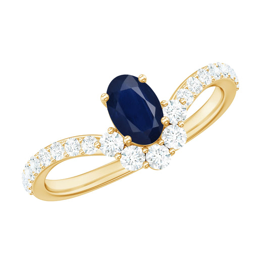 Anillo de chevron con zafiro azul ovalado de 0,6 quilates y diamantes