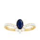 0.6 Carat Oval Cut Blue Sapphire and Diamond Chevron Ring