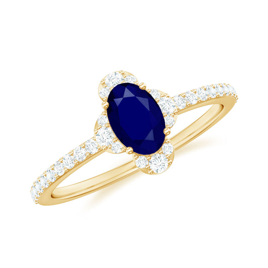 Anillo de compromiso ovalado con zafiro azul natural de 0,6 quilates con diamante