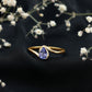 Anillo de compromiso solitario de tanzanita natural con vástago de derivación