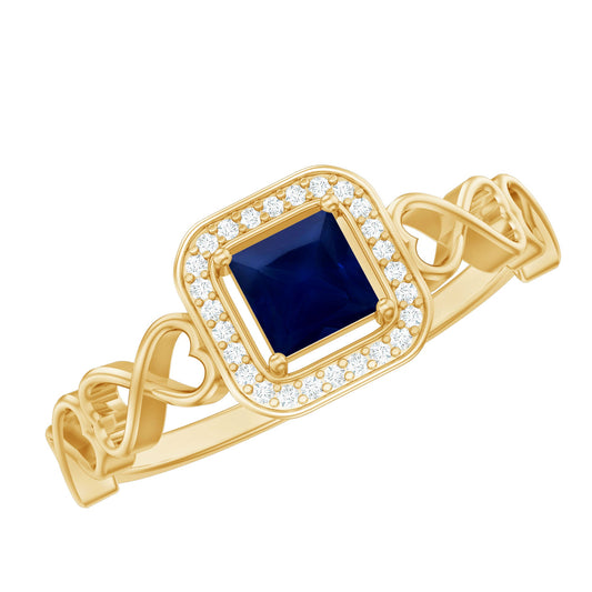 Anillo de compromiso de princesa natural con zafiro azul y diamante con vástago de corazón infinito