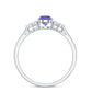 0.8 Carat Pear Shaped Tanzanite Engagement Ring with Diamond Trio