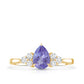 0.8 Carat Pear Shaped Tanzanite Engagement Ring with Diamond Trio