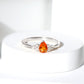 0.6 Carat Pear Shaped Fire Opal Engagement Ring with Diamond Trio