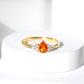 0.6 Carat Pear Shaped Fire Opal Engagement Ring with Diamond Trio