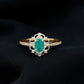Vintage Style Emerald and Diamond Oval Engagement Ring