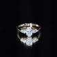 Oval and Pear Cut Moissanite Three Stone Engagement Ring