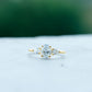 Oval and Pear Cut Moissanite Three Stone Engagement Ring