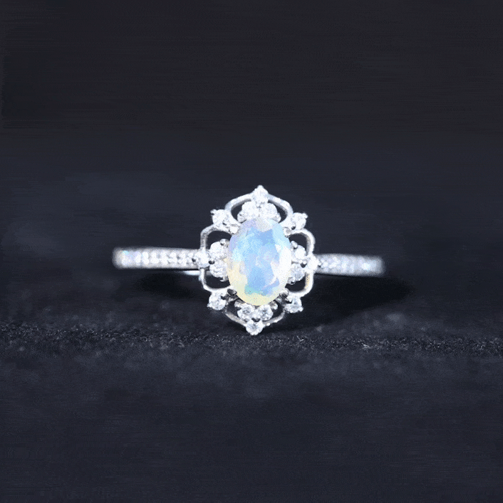 Anillo de compromiso de aspecto vintage de ópalo arcoíris etíope ovalado natural con diamantes