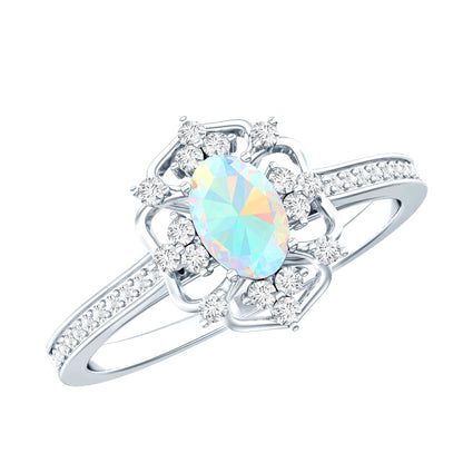 Anillo de compromiso de aspecto vintage de ópalo arcoíris etíope ovalado natural con diamantes