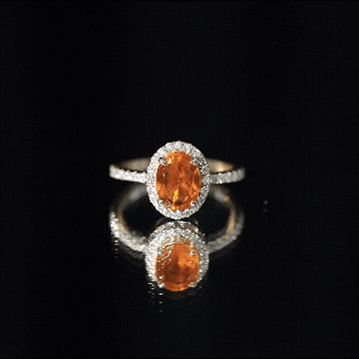 Anillo de compromiso de ópalo de fuego ovalado de 1 quilate con halo de diamantes