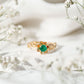 Anillo de compromiso de flor esmeralda natural con diamantes