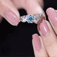 0.6 Carat Round Shape London Blue Topaz Nature Inspired Engagement Ring with Diamond