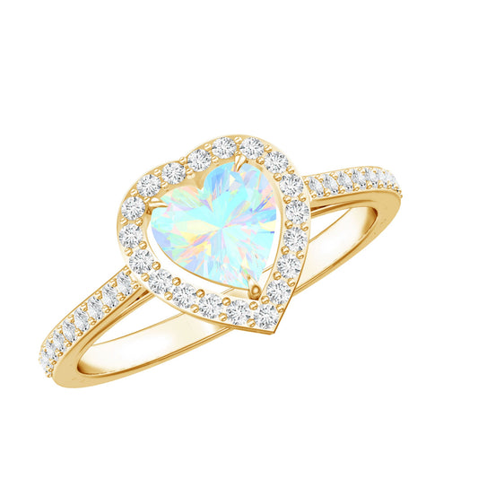 Anillo de compromiso con halo de diamantes y ópalo etíope natural con forma de corazón