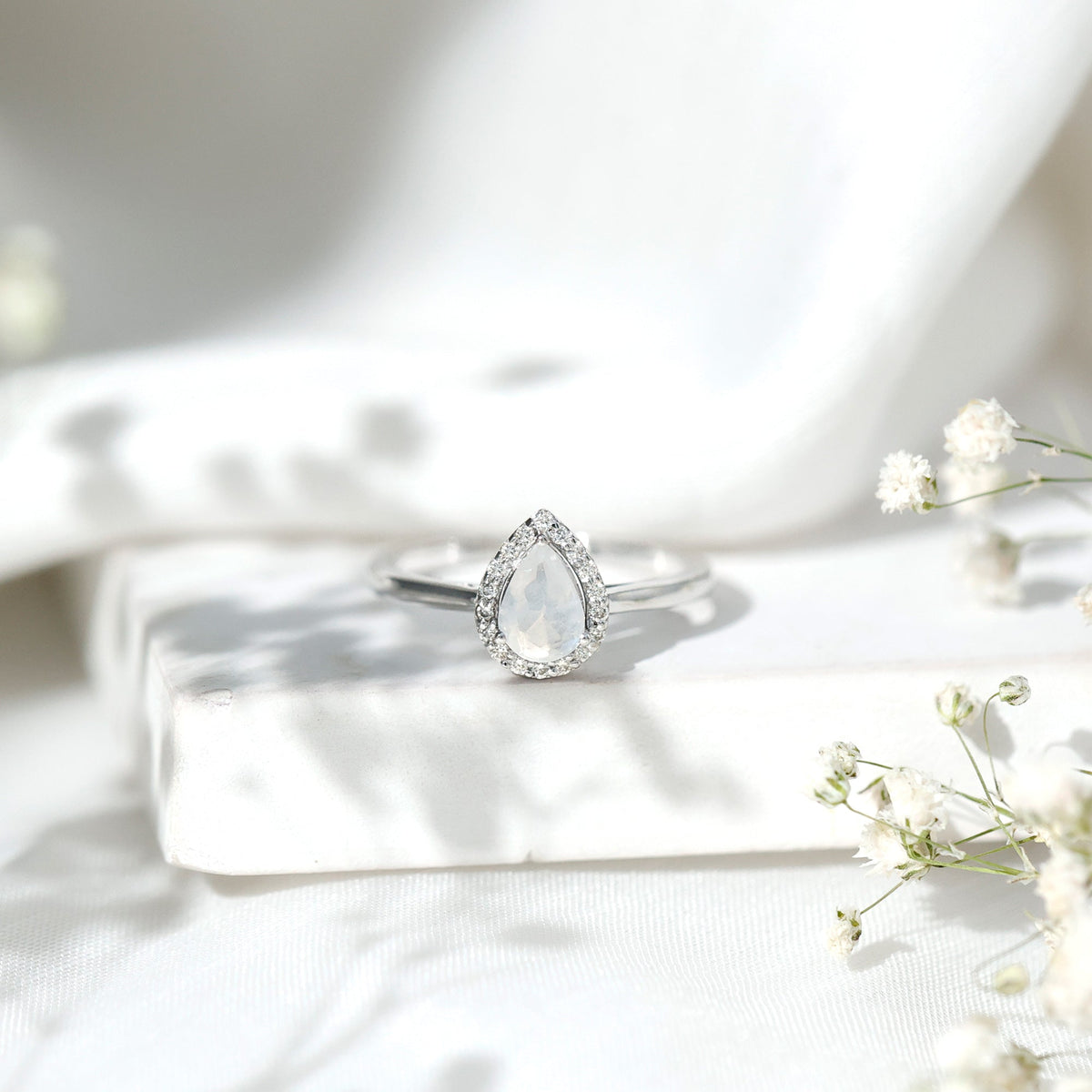 Pear Shaped Moonstone Halo Engagement Ring with Diamond