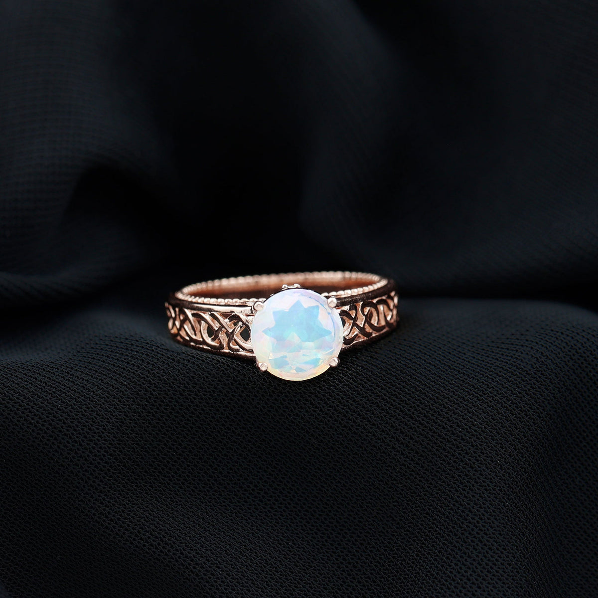 Ethiopian Opal Celtic Knot Engagement Ring with Surprise Diamond