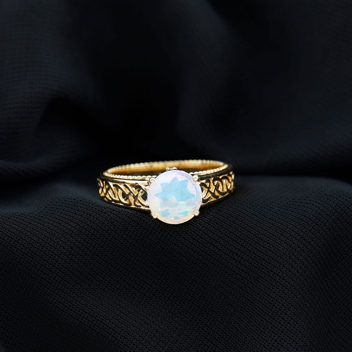Ethiopian Opal Celtic Knot Engagement Ring with Surprise Diamond