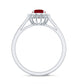 Anillo de compromiso de rubí natural de 0.6 quilates con halo de diamantes