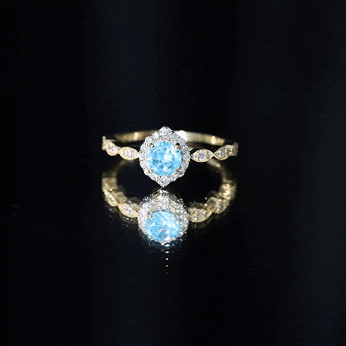 Anillo de compromiso de diseño con aguamarina de 0,8 quilates y diamantes